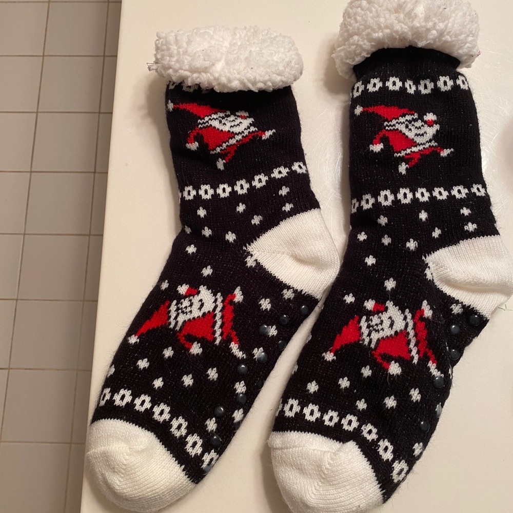 Gently worn fleece lined socks. Machine washable.
